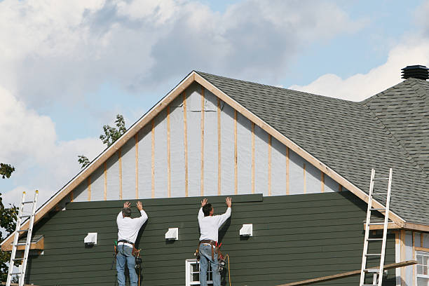Professional Siding Contractor technician working in Holbrook, NY